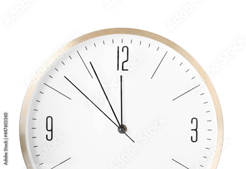 Clock showing five minutes until midnight on white background, closeup. New Year countdown