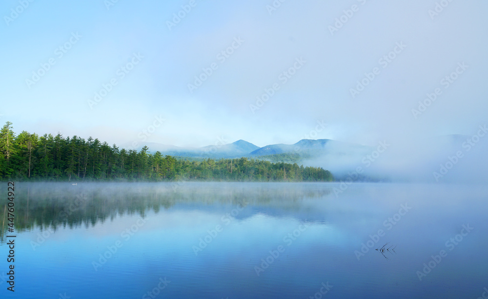  landscape of morning lake in the fog