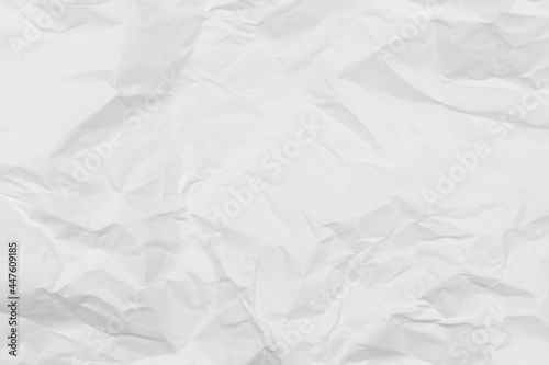 White crumpled paper texture background.