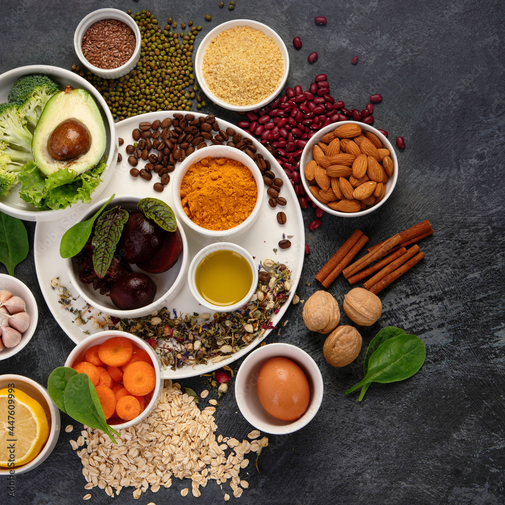 Best products for healthy liver on dark gray background. Clean eating concept. Best products for healthy liver on dark gray background. Clean eating concept.