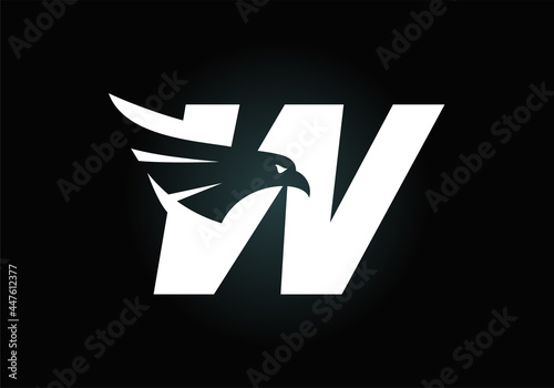 Initial W monogram letter alphabet with Eagle head negative space symbol. Creative Eagle head vector illustration. Modern logo design for business, and company identity.