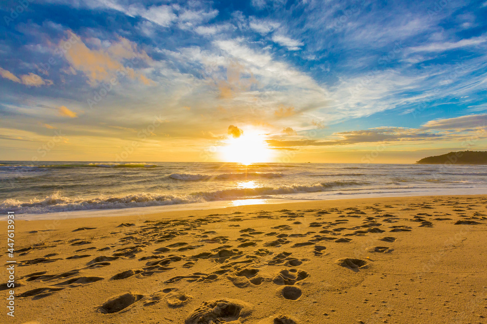Stunning sunset on the tropical ocean - Gold and Blue Stunning sunset on the tropical ocean - Gold and Blue