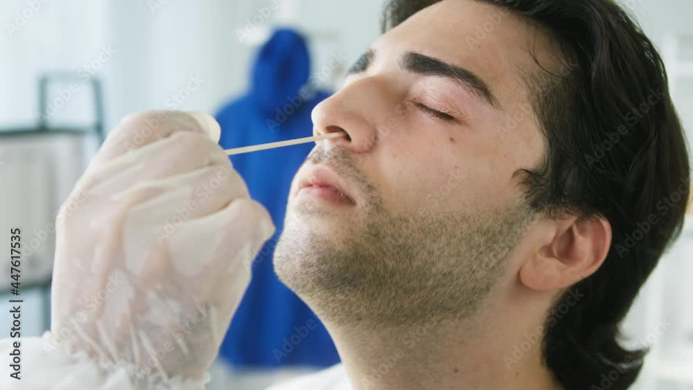 PCR test process, Doctor wearing protective equipment taking sample