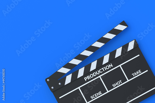 Movie clapper board on blue background. Filmmaking accessories. Cinematography concept. Film in the cinema. Top view. Copy space. 3d render