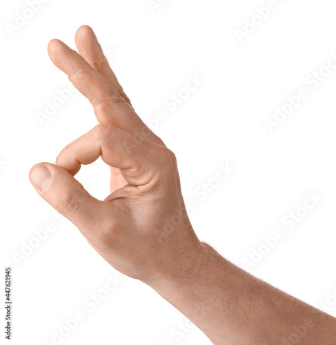 Man showing OK gesture on white background