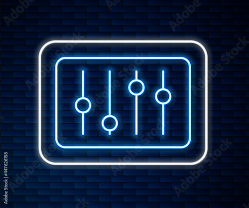 Glowing neon line Sound mixer controller icon isolated on brick wall background. Dj equipment slider buttons. Mixing console. Vector