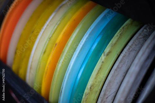 Many disc golf discs in the bag.