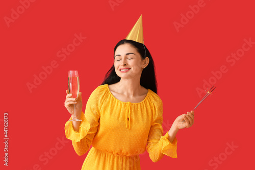 Joyful woman celebrating wi...