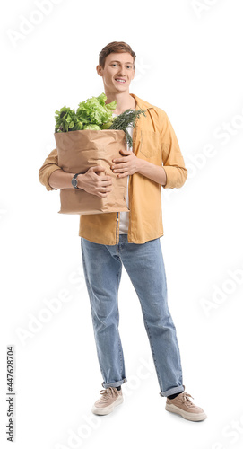 Young man and paper bag wit...