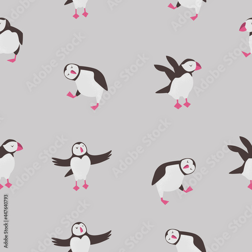Seamless pattern with cute puffins in different poses