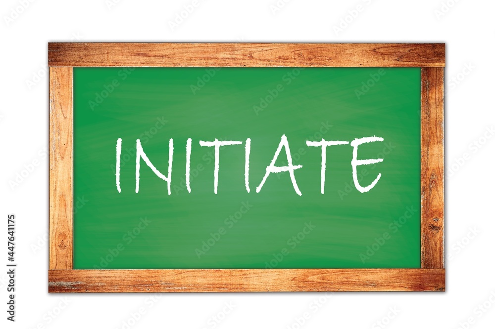 INITIATE text written on green school board. INITIATE text written on green school board.