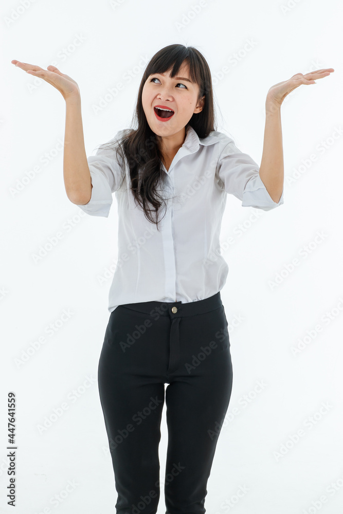 Smart young lady long hair white shirt black pant casual style. Standing smiling point up like showing sign, text, promotion with white background. Portrait good for index finger, advertise. Smart young lady long hair white shirt black pant casual style. Standing smiling point up like showing sign, text, promotion with white background. Portrait good for index finger, advertise.