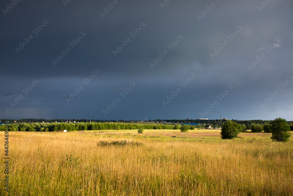 landscape with majestic beautiful dramatic pre-threatening sky. Cloudy sky