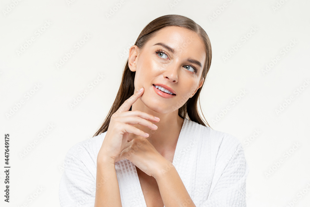 Young beautiful Caucasian woman thinking with hand touching face on isolated studio white background Young beautiful Caucasian woman thinking with hand touching face on isolated studio white background