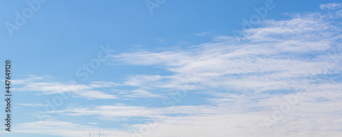 White cloud on beautiful clear blue sky in summer holiday indicates excellent environment of fresh, clean air, no pollution weather, and happy to breathe for good health