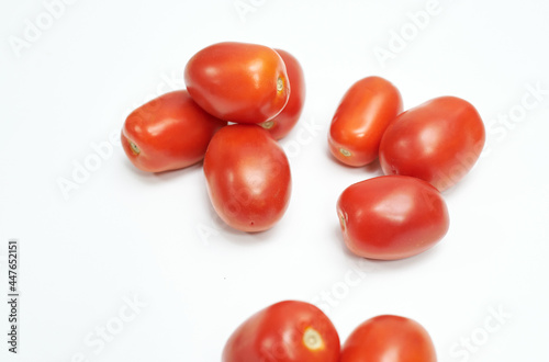 ripe fresh tomatoes cream on white background