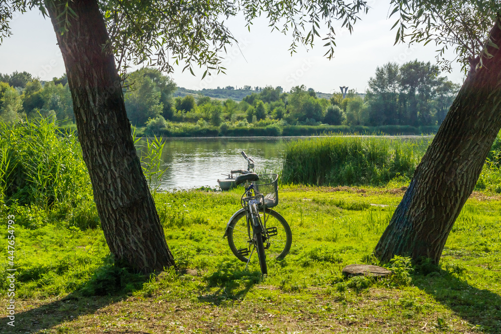 Bike on the river bank