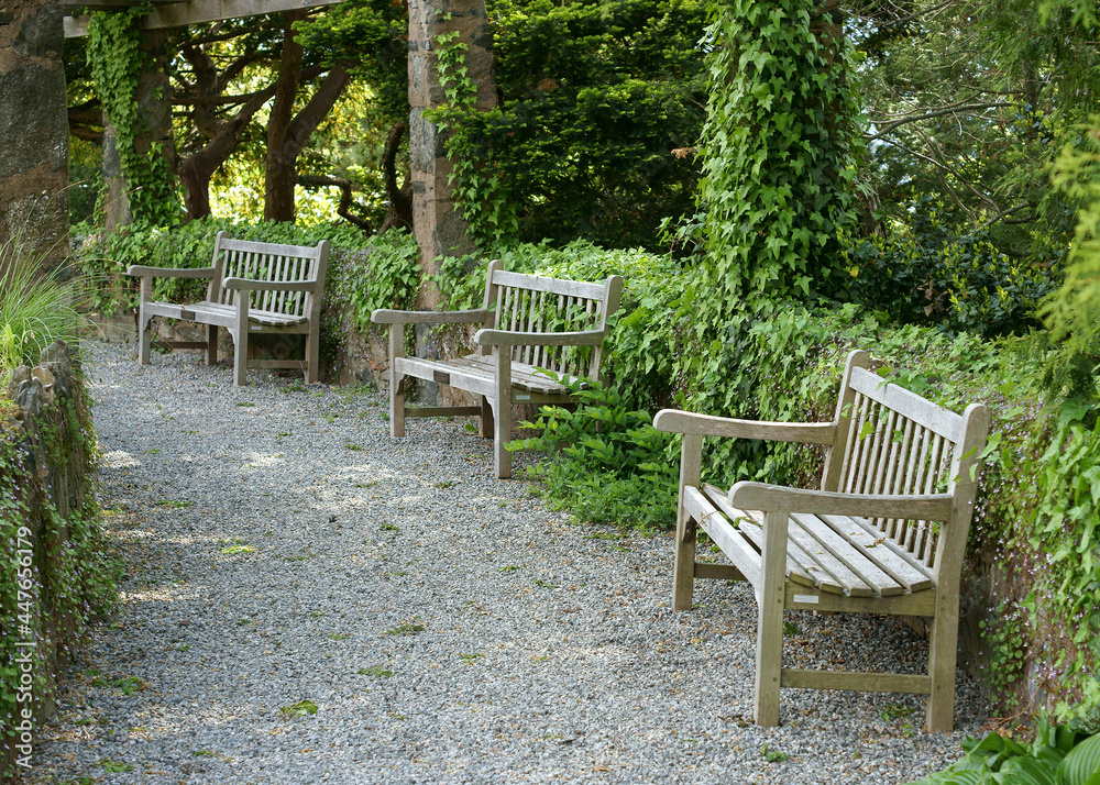 Wooden benches for rest. Wave Hill in Hudson Hill of Riverdale in Bronx, New York City Wooden benches for rest. Wave Hill in Hudson Hill of Riverdale in Bronx, New York City
