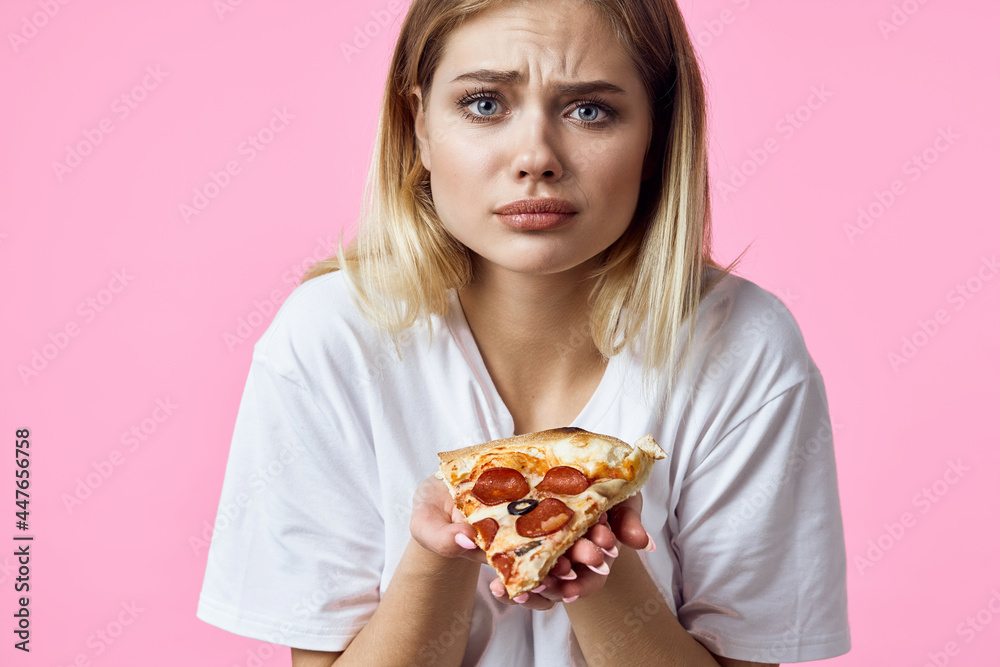 cheerful pretty woman in white t-shirt pizza fast food snack restaurant cheerful pretty woman in white t-shirt pizza fast food snack restaurant
