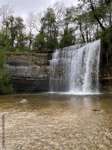 Fototapeta Saut de la Forge waterfall is one of the several falls of the Cascade du hérisso