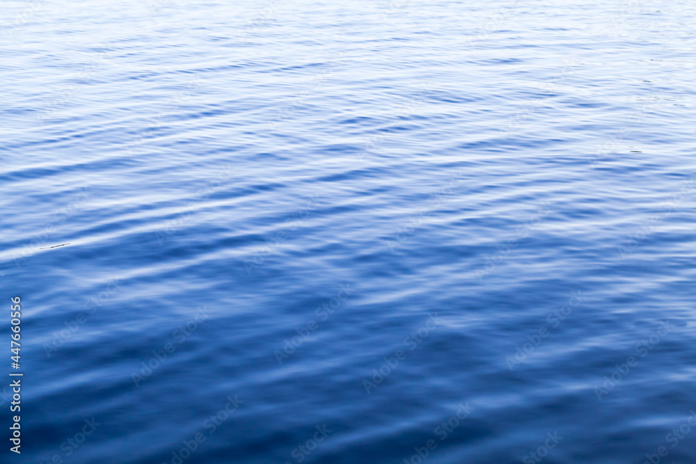 Blue water surface with ripple pattern Blue water surface with ripple pattern