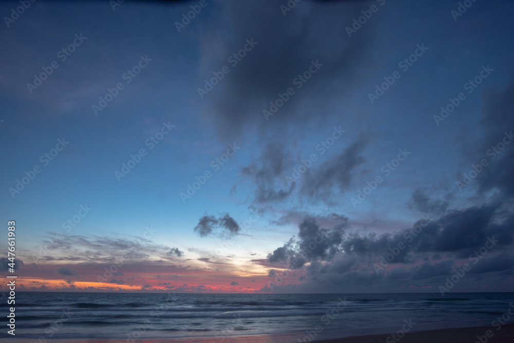 Scene of Colorful romantic sky sunset with Changing the color of the sky background. .beautiful sky at sunset in nature and travel concept. Scene of Colorful romantic sky sunset with Changing the color of the sky background. .beautiful sky at sunset in nature and travel concept.
