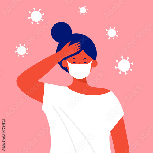 Woman in protective medical face mask holding forehead with her hand, having headache, suffering pandemic fatigue - Female character feeling exhausted, tired during coronavirus outbreak, lockdown