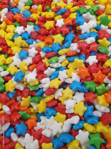 Lots of bright and tasty sweets.  The candies are made in the shape of stars and painted in a variety of rich colors.