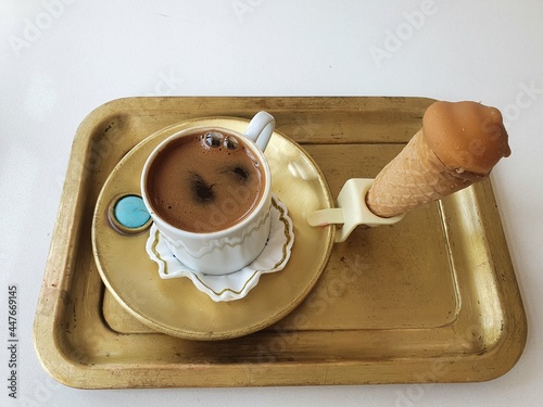Delicious, strong and aromatic Turkish coffee.  Served with ice cream on a brass tray.