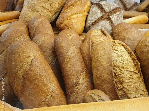 Delicious and fresh bread.  The flavored bread is baked in the bakery and placed on the shelf for sale.