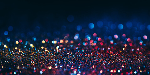 Abstract neon halftone color bokeh texture. Sparkling blur holiday light banner layout. Christmas and new year eve blurred background. Disco music bright glow design.