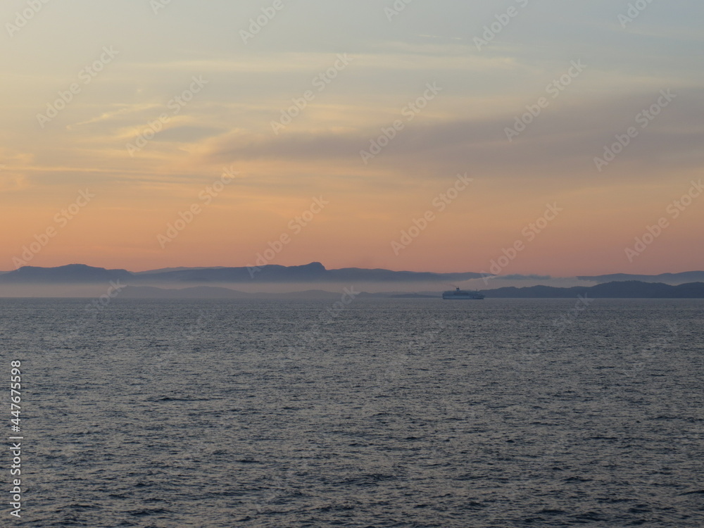 Sunrise over Corsica seen from the ferry
