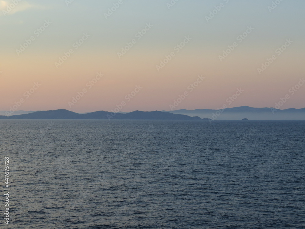 Sunrise over Corsica seen from the ferry