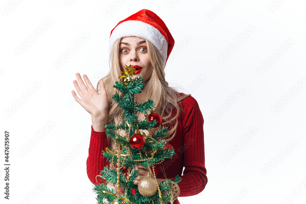 pretty woman dressed as santa claus christmas tree toys holiday decoration