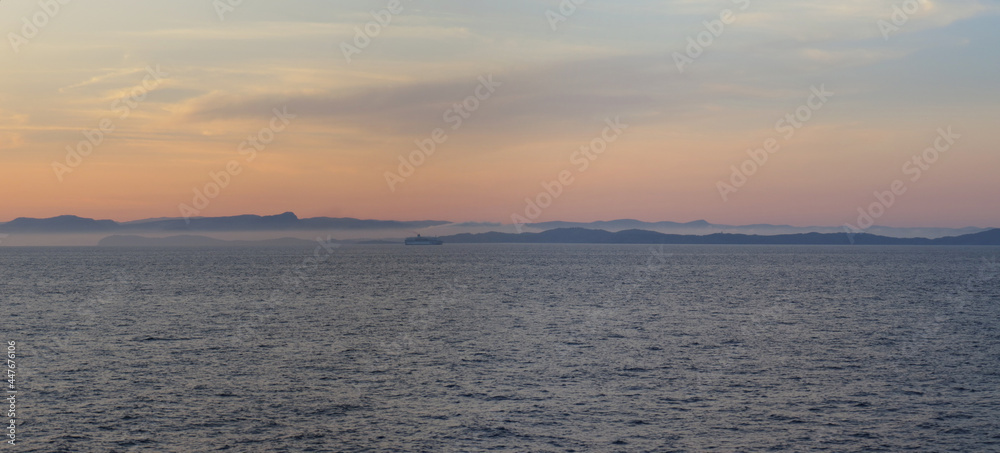 Sunrise over Corsica seen from the ferry