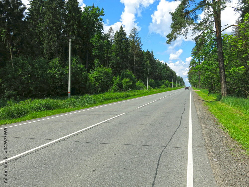 deserted asphalt highway in summer