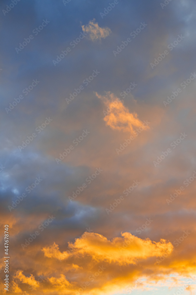 Clouds with orange sunset light