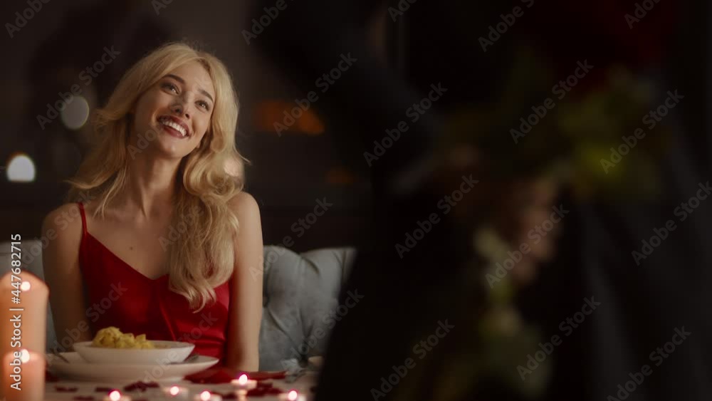 Boyfriend Surprising Girlfriend Giving Flowers During Date In Restaurant Boyfriend Surprising Girlfriend Giving Flowers During Date In Restaurant