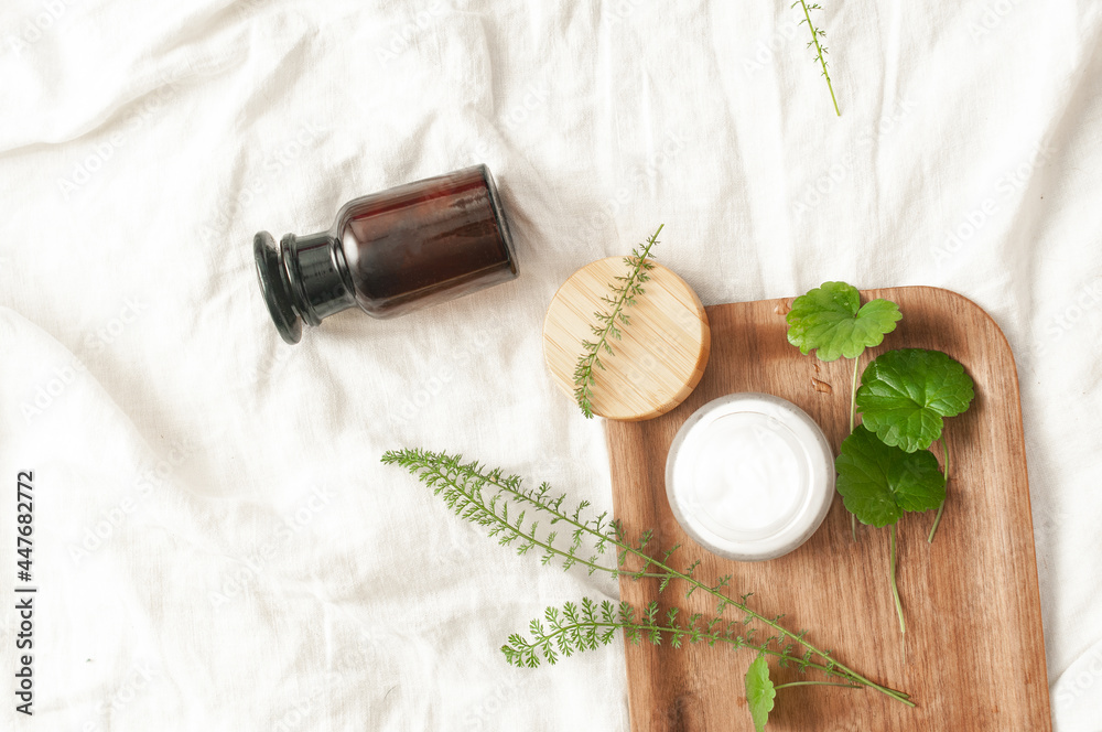 Sustainability concept cosmetic background brown glass veil with product flat lay green natural beauty bblog concept Sustainability concept cosmetic background brown glass veil with product flat lay green natural beauty bblog concept