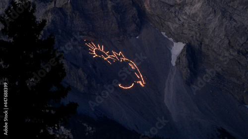 Mountain fire at Zugspitze mountain and Ehrwalder Sonnenspitze mountain in Tyrol, Austria photo