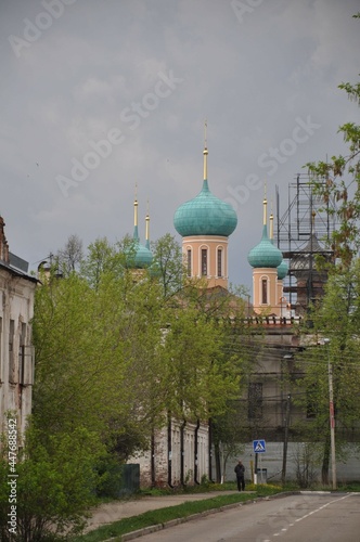Temple of the Nativity Convent. An ancient nunnery. Street of the ancient city. A temple with blue domes on red reels. 