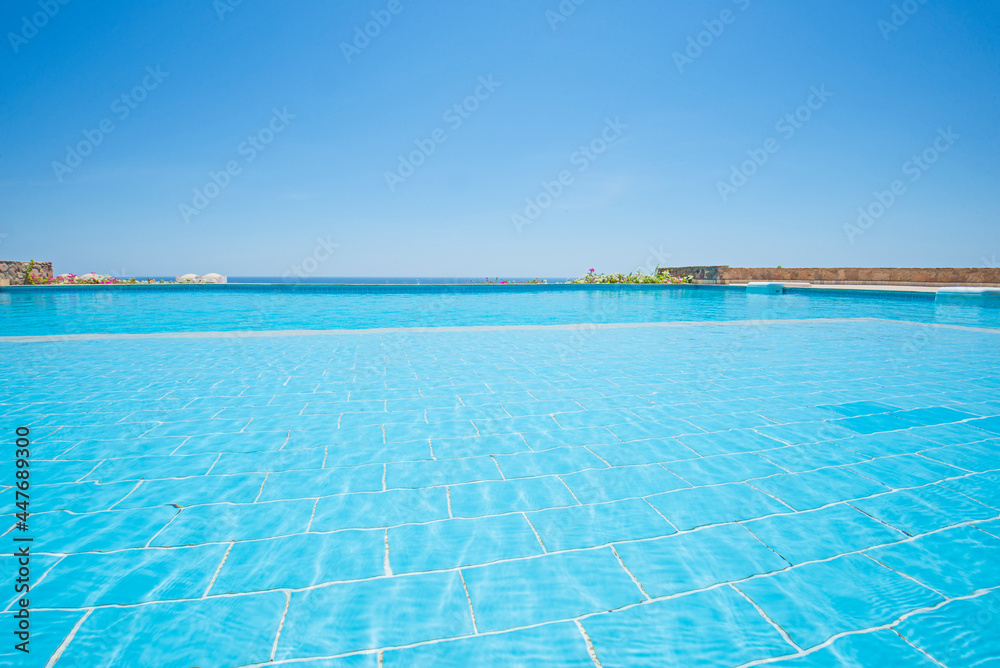 Outdoor swimming pool in a luxury tropical hotel resort