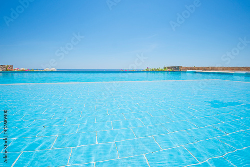 Outdoor swimming pool in a luxury tropical hotel resort