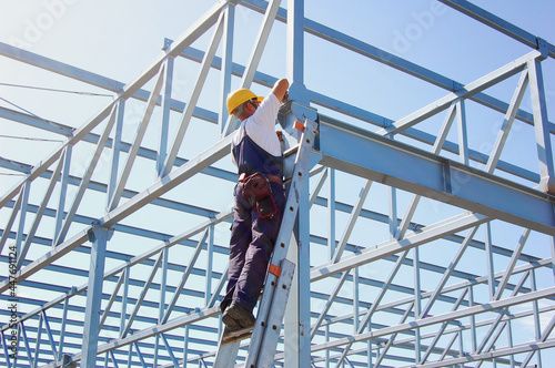 Iron Worker on Constructions Site Reconstruction photo