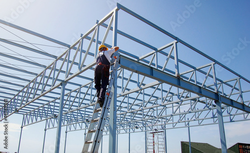 Iron Worker on Constructions Site Reconstruction photo