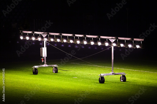 Bilde på lerret Assimilation lighting on a grass soccer field