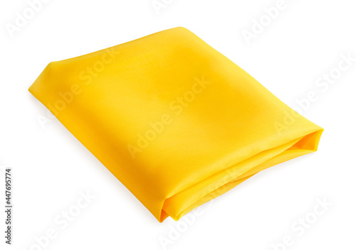 folded piece of bright yellow fabric isolated on white background