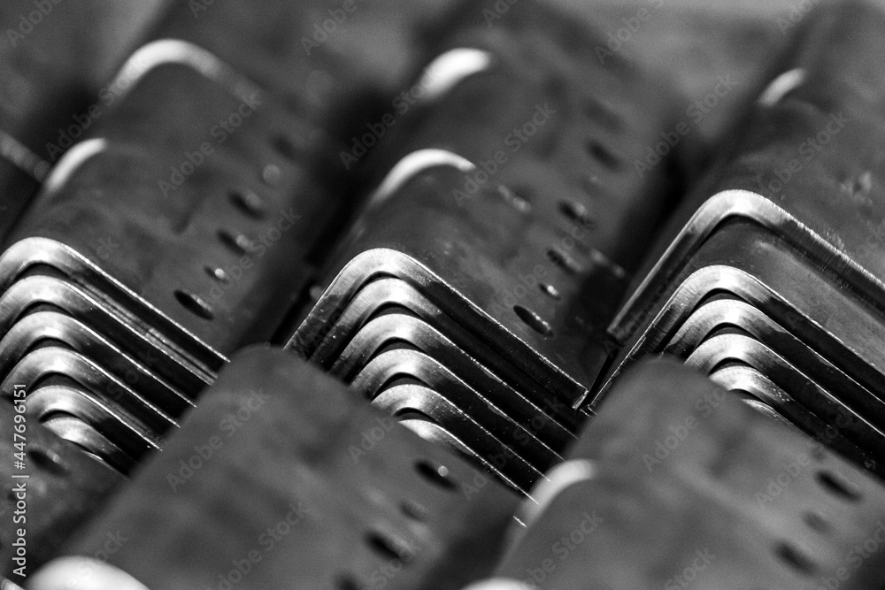 a stack of metal parts at the factory in the shop a stack of metal parts at the factory in the shop