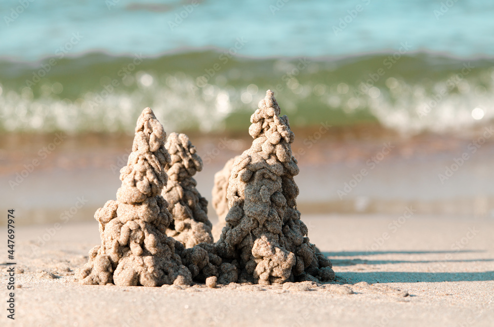 Photo of sand castle on the beach background Photo of sand castle on the beach background
