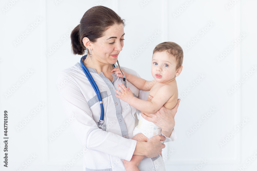 pediatrics, a doctor examines a baby boy, the concept of medicine and health pediatrics, a doctor examines a baby boy, the concept of medicine and health